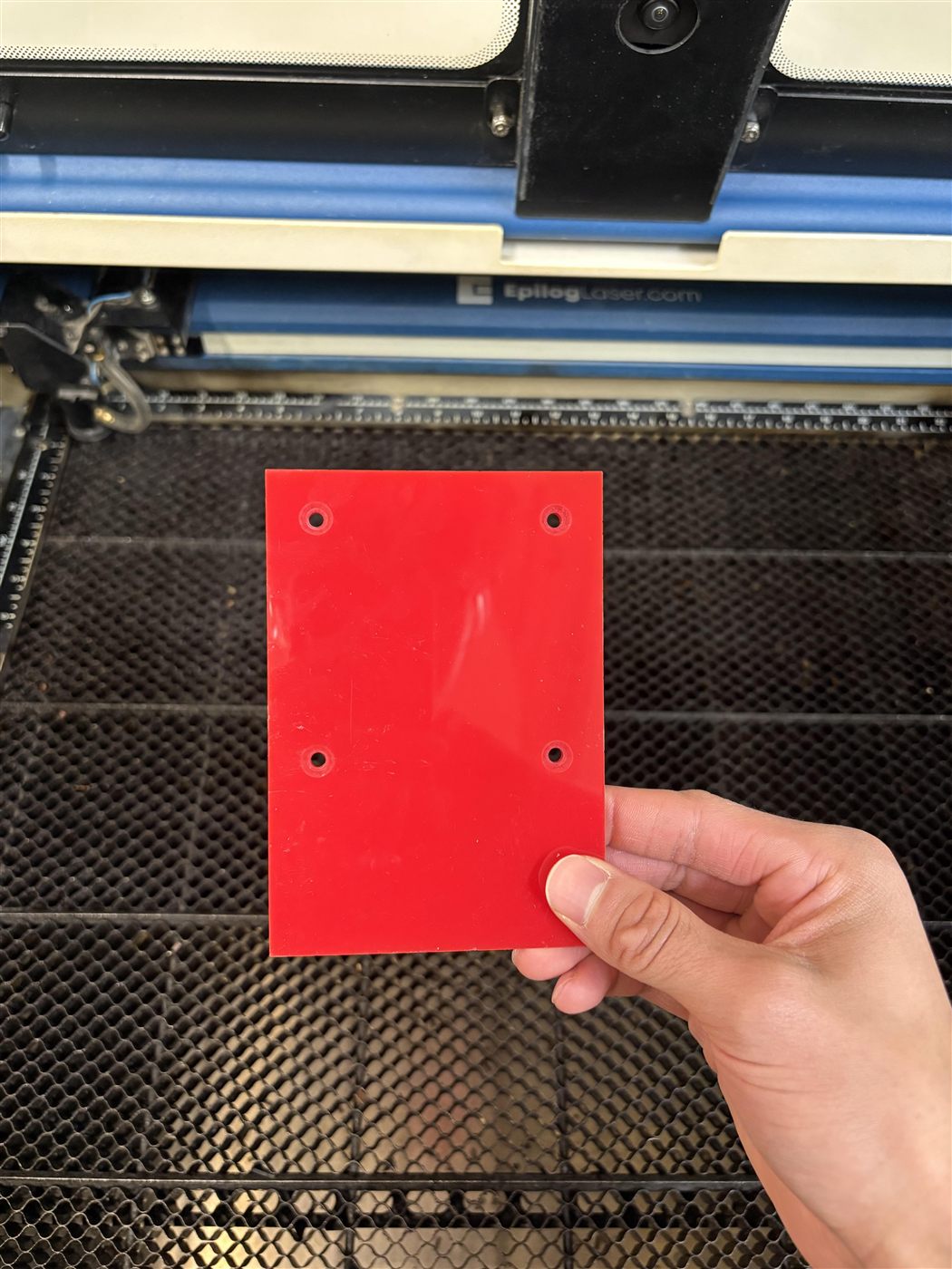 Laser-engraved red acrylic plate